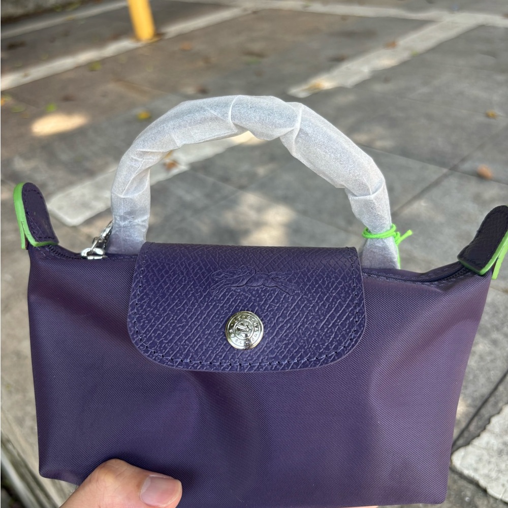Longchamp mini top-handle bag in purple with lime trim